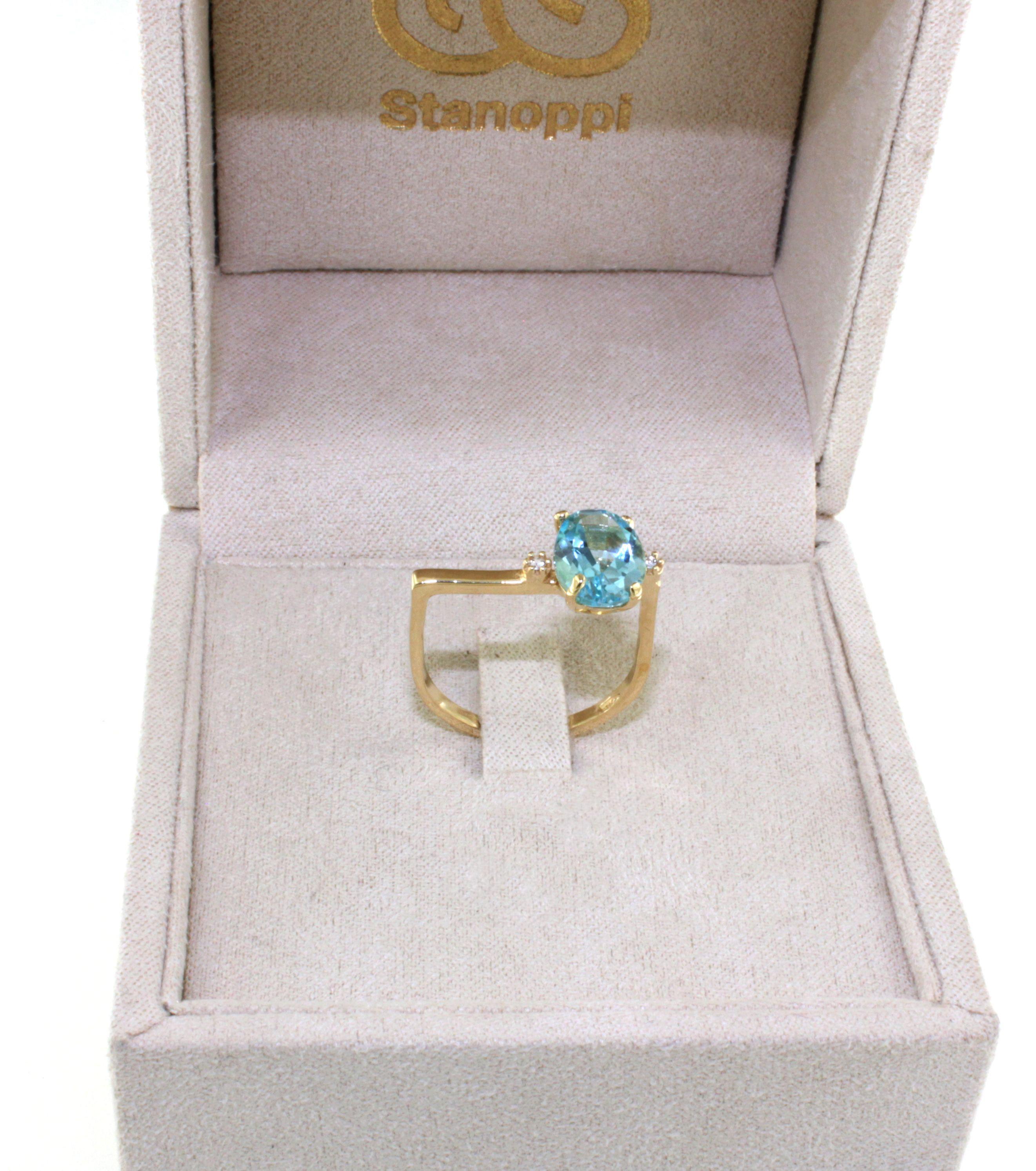 Bague en or jaune 18Kt avec pierre de topaze bleue naturelle et zircon Design/One Unisexe en vente