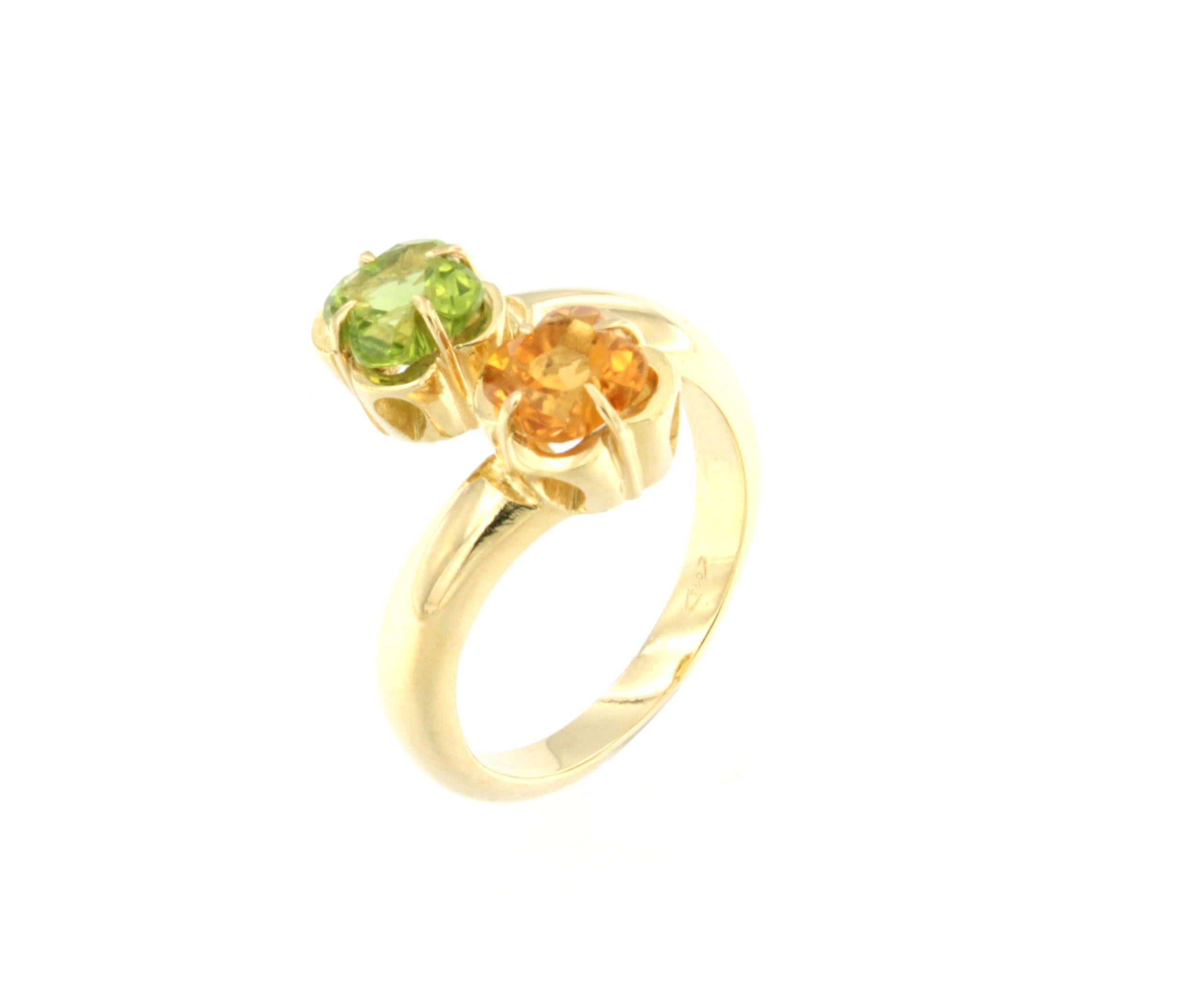 Inspired by nature, flowers are synonymous with happiness. Two delicate flowers that intertwine and caress your hand.  Made in Italy  by Stanoppi Jewellery since 1948.
Stones:  Citrine and Peridot 
Size :  14 - 54 - 7    yellow gold g.7.00

All