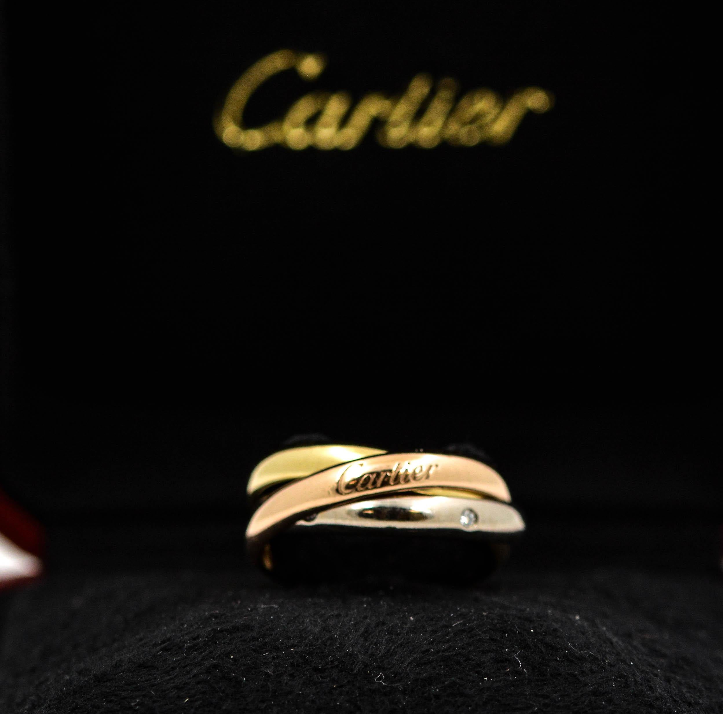 cartier trinity ring on hand