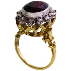 18kt Yellow & White Gold, 11 Carat Garnet and 1 Carat Diamond Ring