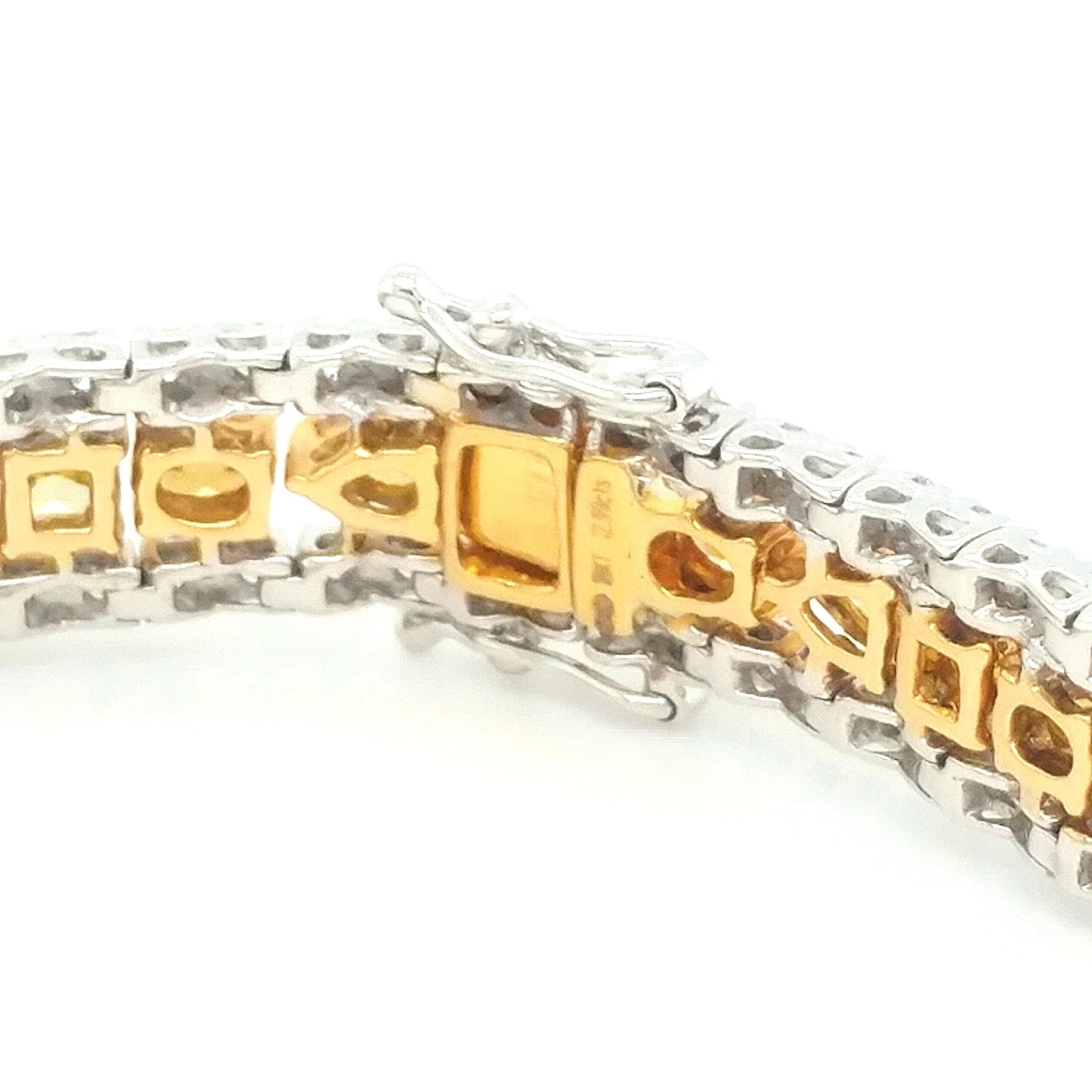A beautiful 18kt white and yellow gold bracelet featuring 9.60 Carats of Cushion Modified Brilliant, Oval Brilliant & Pear Modified Brilliant Color-Enhanced Brown, Yellow & Orange Diamonds & 3.40 Carats of Round Brilliant Diamonds. Some of the fancy