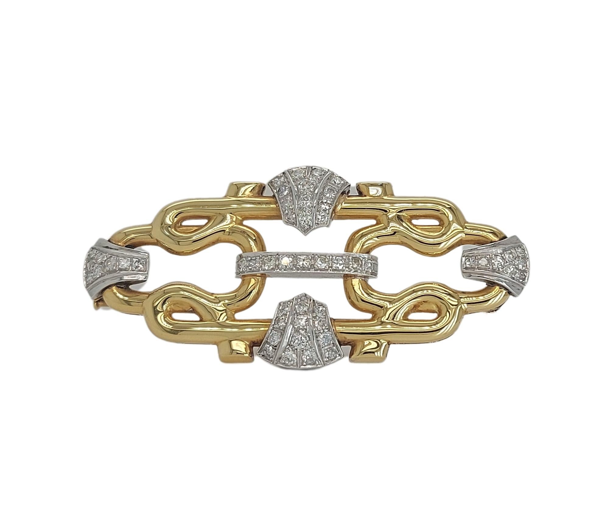 Gorgeous 18kt Yellow and White Gold Brooch with 1.2ct Diamonds

Diamonds: 51 brilliant cut diamonds together 1.2ct

Material: 18kt yellow and white gold

Total weight: 13.2 grams / 0.465 oz / 8.5 dwt

Measurements: 60 mm x 27.60 mm x 8 mm