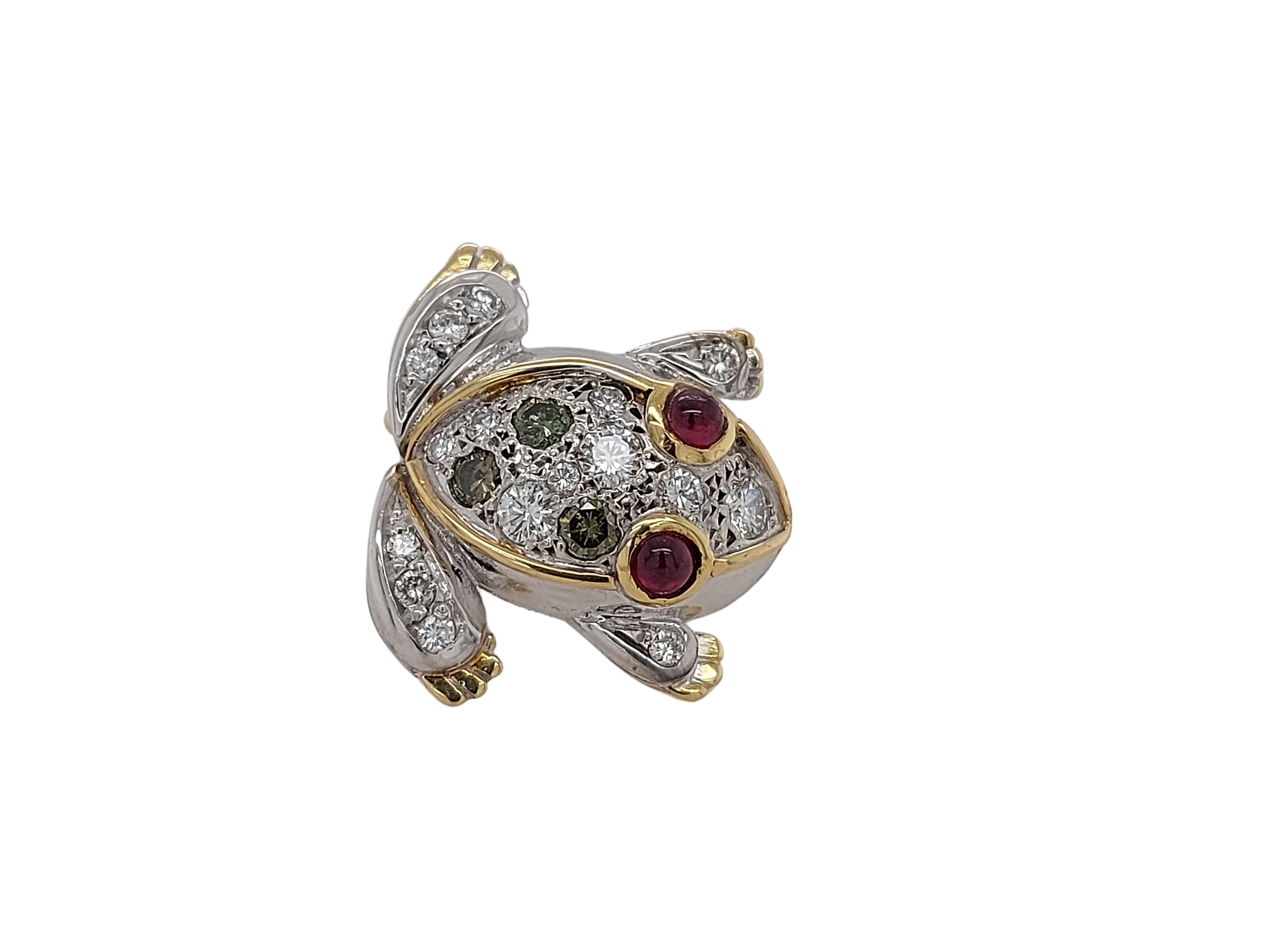 Original 18kt Yellow & White Gold Frog Brooch set with Diamonds & Rubies  

Diamonds: 19 brilliant cut diamonds

Ruby: 2 cabochon ruby 

Material: 18 kt yellow and white gold

Measurements: 21 mm x 18.5 mm

Total weight: 6.4 grams / 4.1 dwt / 0.225