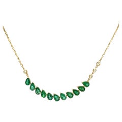 18Kt YG Emerald and Diamond necklace