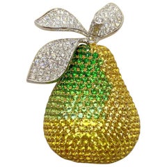 18 Karat YG & WG Pear Brooch with Diamonds, Yellow Sapphires and Tsavorites