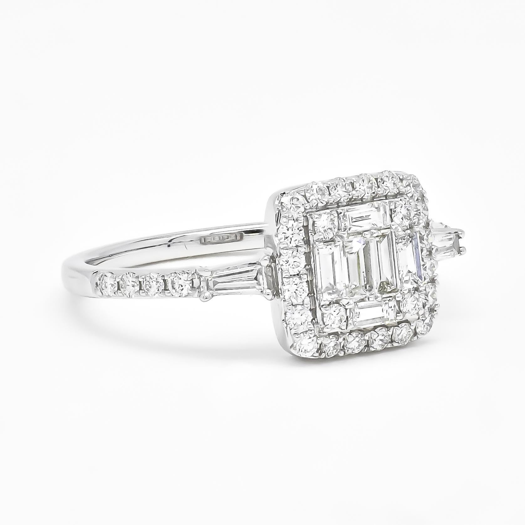 Dazzle and drama come together in this stunning diamond halo cluster engagement ring set with skill and craftsmanship in 18k white gold.

The unique sheen of diamond baguettes is showcased in this beautiful engagement ring, designed in white gold