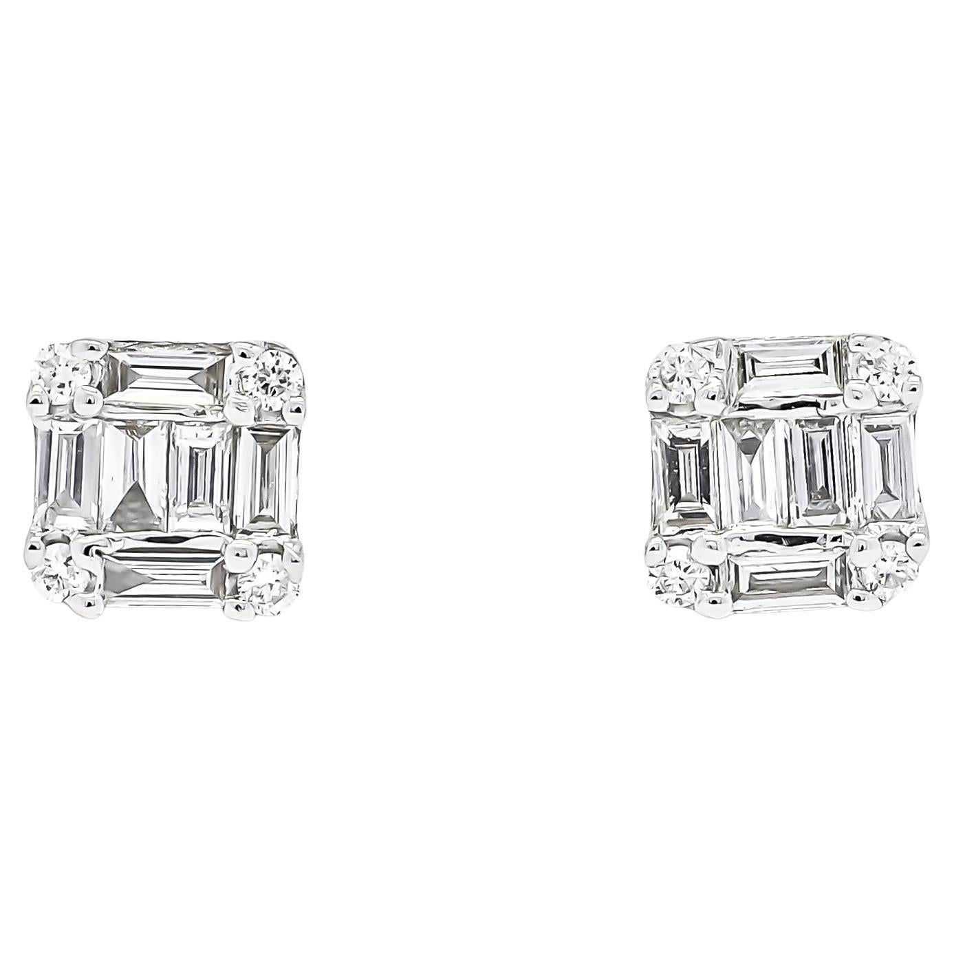 These 18KT white gold stud earrings feature a unique illusion square design, adorned with sparkling baguette cut and round brilliant natural diamonds. The cluster illusion of diamonds creates a dazzling effect, making these earrings a best-seller.