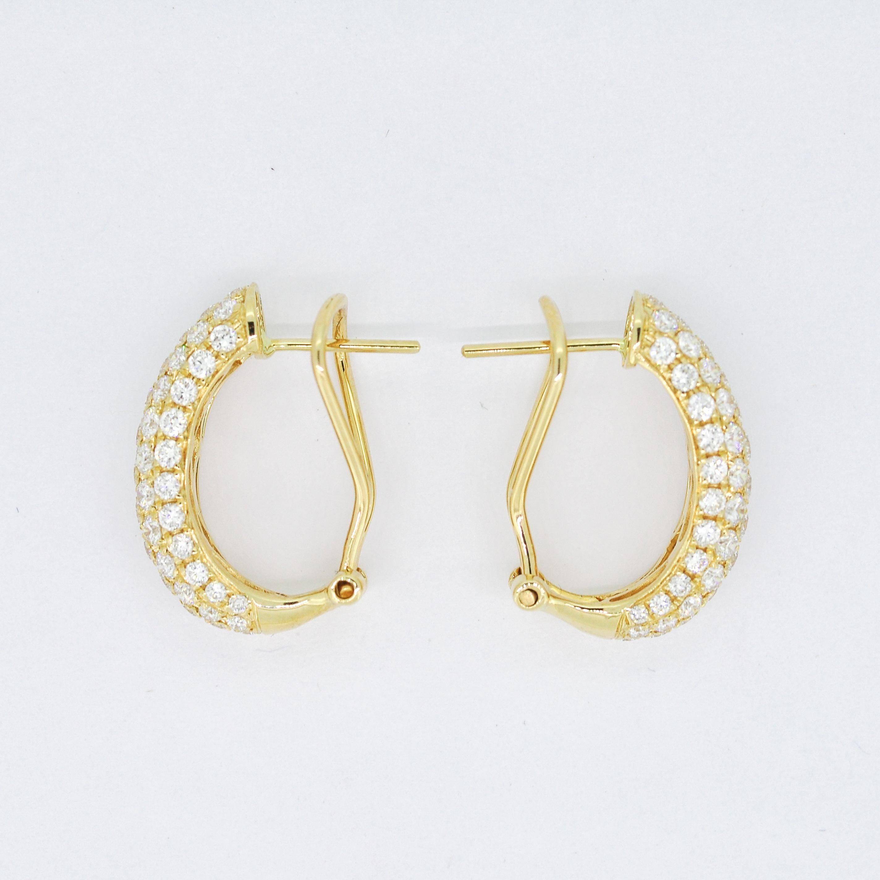 ntroducing our breathtaking 18k yellow gold hoop earrings adorned with a dash of 5 Row round-shape diamond pavé. These earrings are designed to add a brilliant dazzle to any ensemble, ensuring you stand out with elegance and sophistication.

Crafted