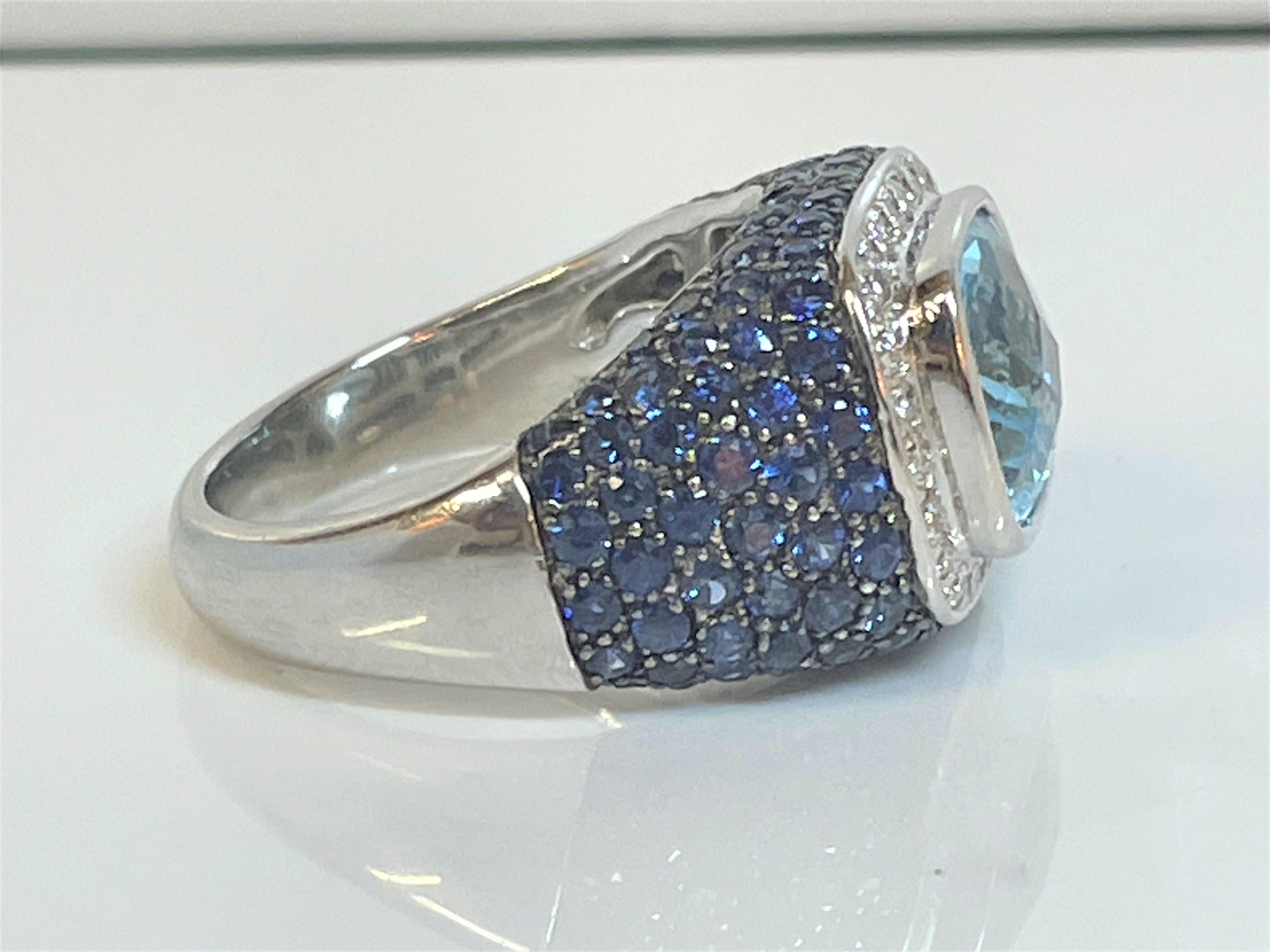 Women's or Men's 18KW 5.9ct Blue Topaz, Blue Sapphire & Diamond Ring For Sale