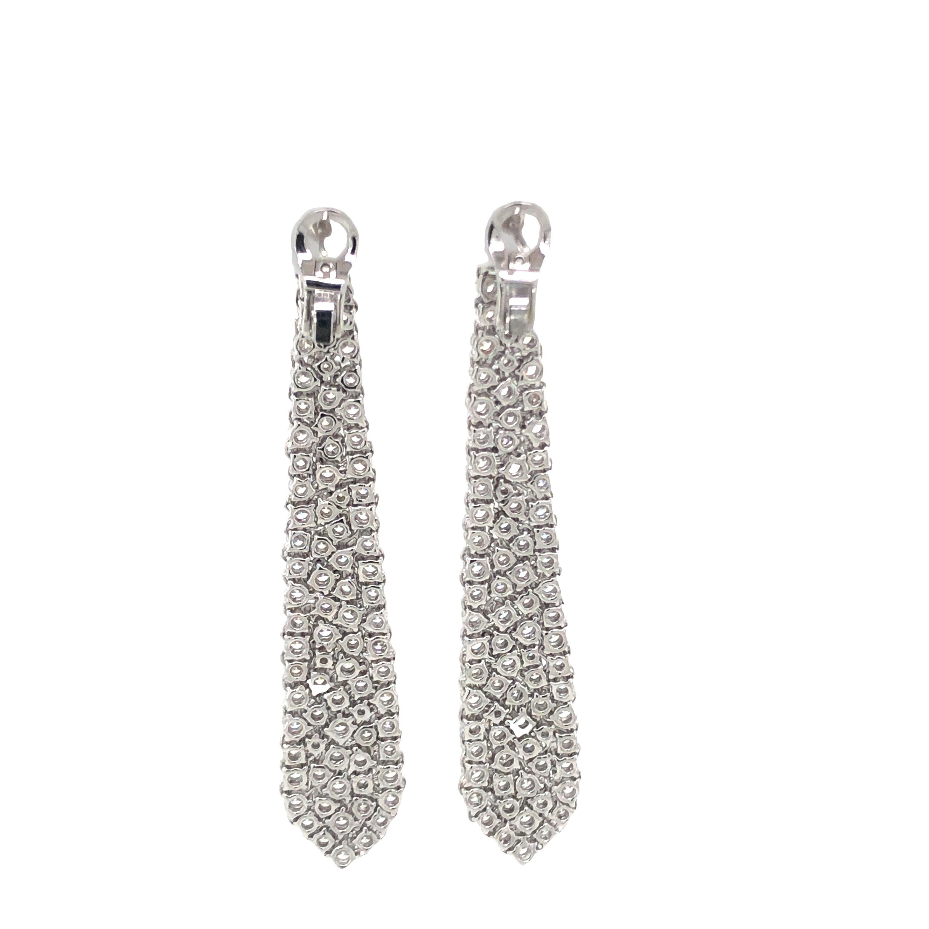 Modern 18KWG 7.50 CTS Diamond Dangle Earrings For Sale