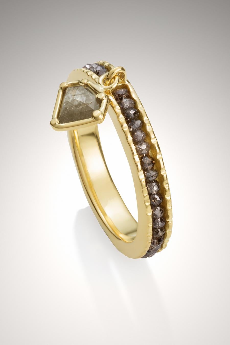 18KY Ring with Brown Diamonds and Brown Diamond Charm is a lovely charming ring, with a sweet little dangling Diamond charm.  The warmth of the Brown Diamonds blend well with the warmth of the 18K yellow gold.  The Brown Diamond charm is on a link