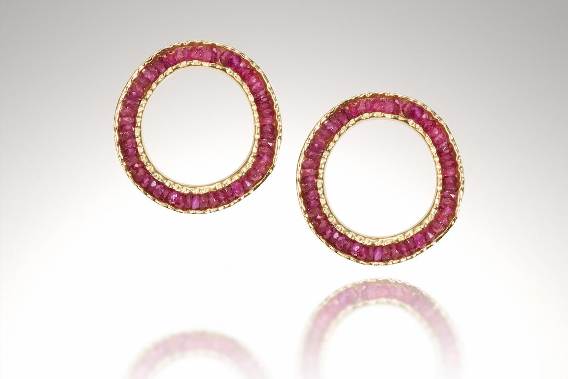 18KY Coin Earrings with Rubies are part of the Coin Collection. I call this collection the Coin collection because of the textured worn edges on these pieces, like the edges on an old coin. 
Coin Earrings are limited production made to order pieces,