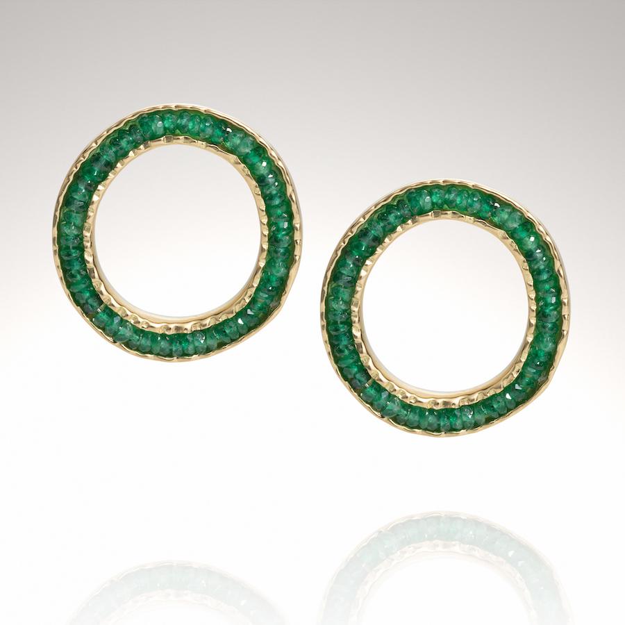 18KY Coin Earrings with Emeralds are part of the Coin collection.  I call this collection the Coin collection because of the textured worn edges on these earrings, like the edges of an old coin.
They are limited production made to order pieces,