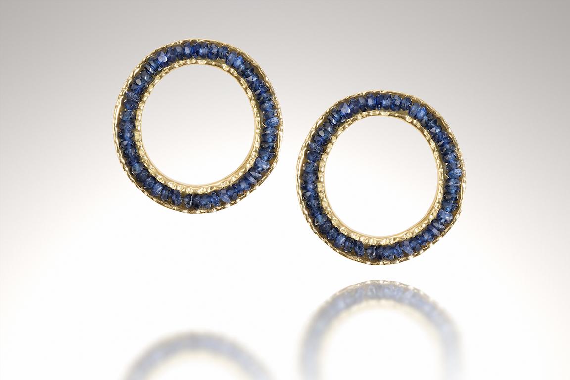 18 KY Coin Earrings with Sapphires are part of the Coin collection. I call this the Coin collection because of the textured worn edges on these pieces, like the edges of an old coin.
Coin Earrings are limited production made to order earrings.  They