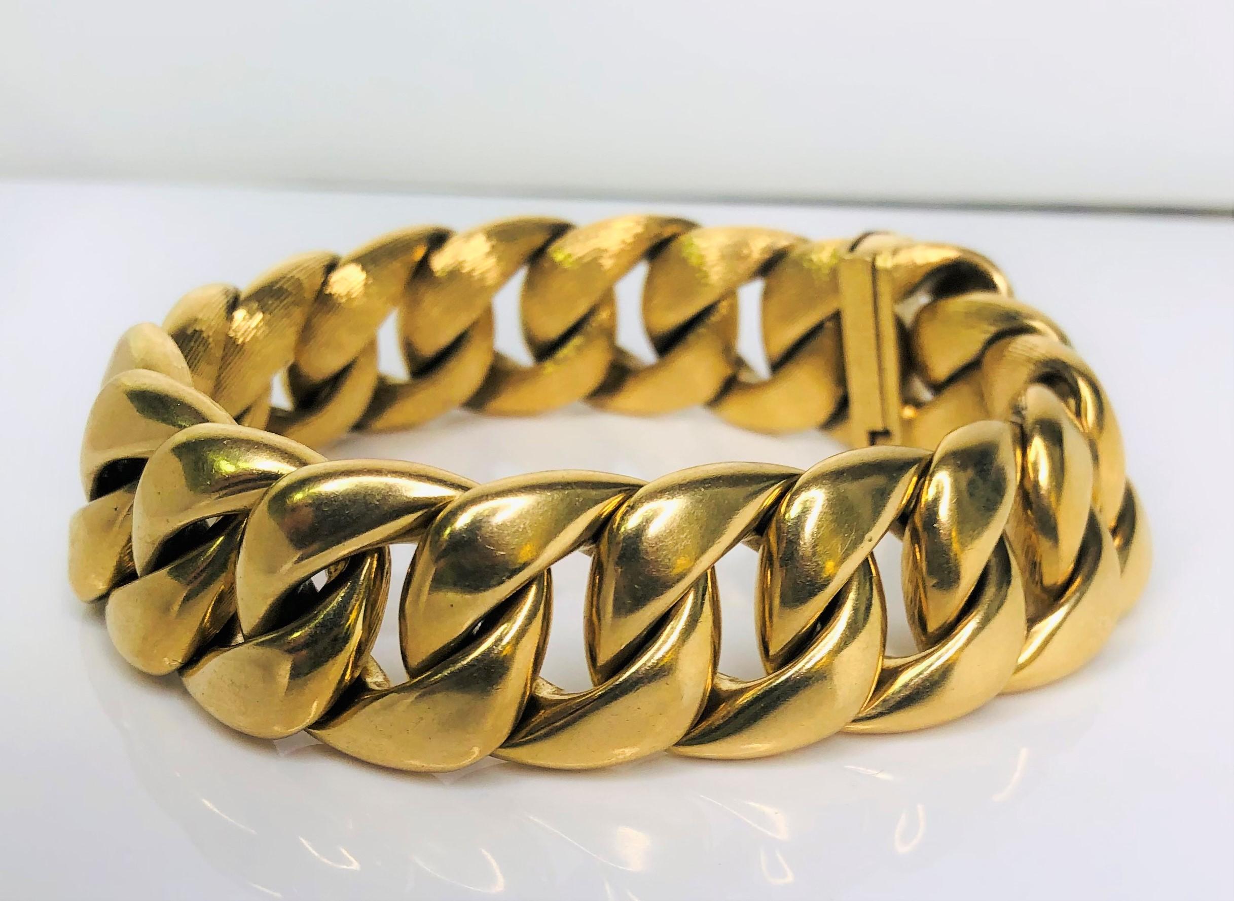 Two beautiful bracelets in one! 
This can be worn with the polished side showing or reversed to show the textured side! 
Great weight and quality!
Cuban link style with slide closure and safety bar
Approximately 7.75 inches long and .75 inches