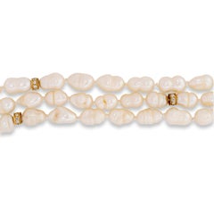 18KY Gold 3 Strand Pearl Necklace with a Yellow Sapphire and Diamond Clasp
