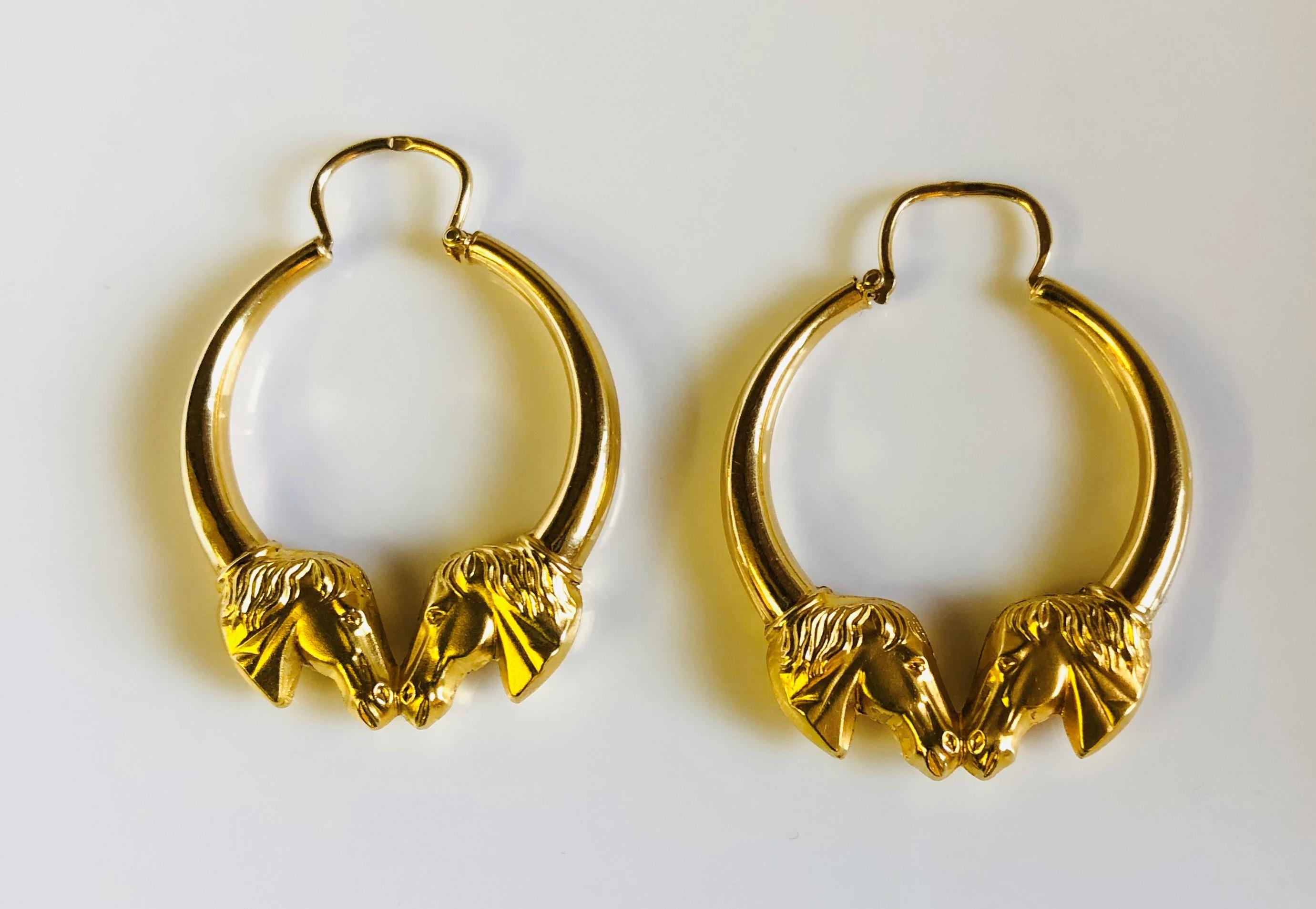 These are great for the equestrian in your life!
18 Karat Yellow Gold Hoop Earrings
Lightweight and very easy to wear!
Approximately 33mm x 26mm X 4mm
Ear Wire Clasp