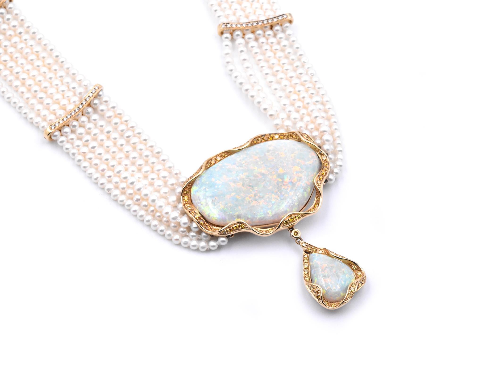 Designer: The Estate Watch & Jewelry Company
Material: 18k yellow gold
Gemstone: 2 opals 
White Diamonds: 78 round brilliant cuts = 0.50cttw
Yellow Diamonds: 93 round yellow diamonds
Dimensions: pearl necklace measures 32 inches in length
Weight: