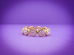 18KY Oval Horizontal Bezel Diamond Eternity Band