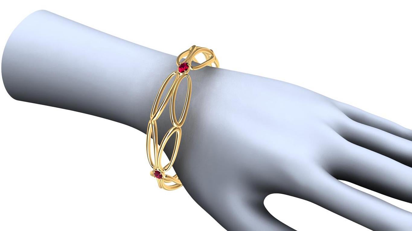 Tiffany designer, Thomas Kurilla created this 18 Karat Yellow Ruby Arabesque Wings Bangle,  Inspired by simplicity and birds flying. I can still got my favorite rhombus shape in to the bracelet. This bangle is airy and light, applying two of my