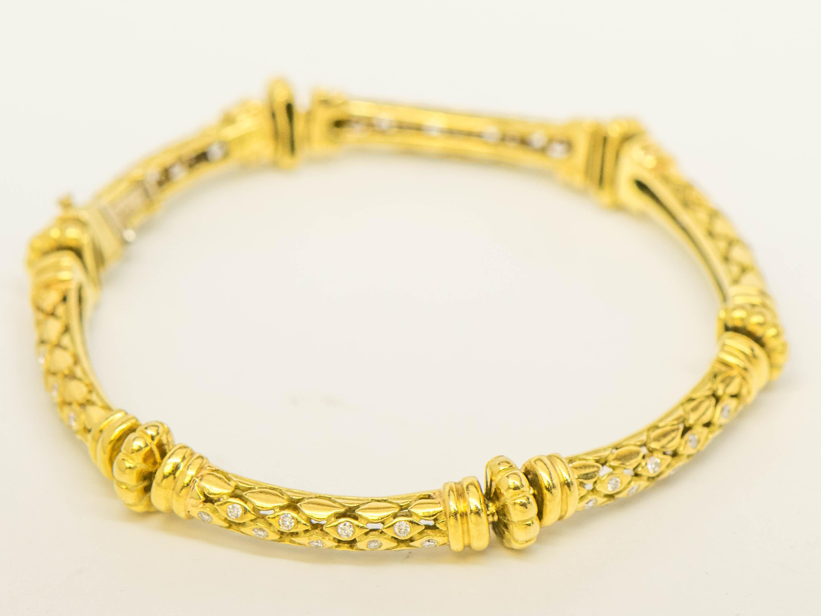 From the well known designer, SeidenGang whose style is appreciated for it's timeless Greek motif fabricated into modern jewelry, is this 18K Yellow Gold Bracelet. This stunning Bracelet is fashioned in a Floral Motif with (77) Round Brilliant Cut