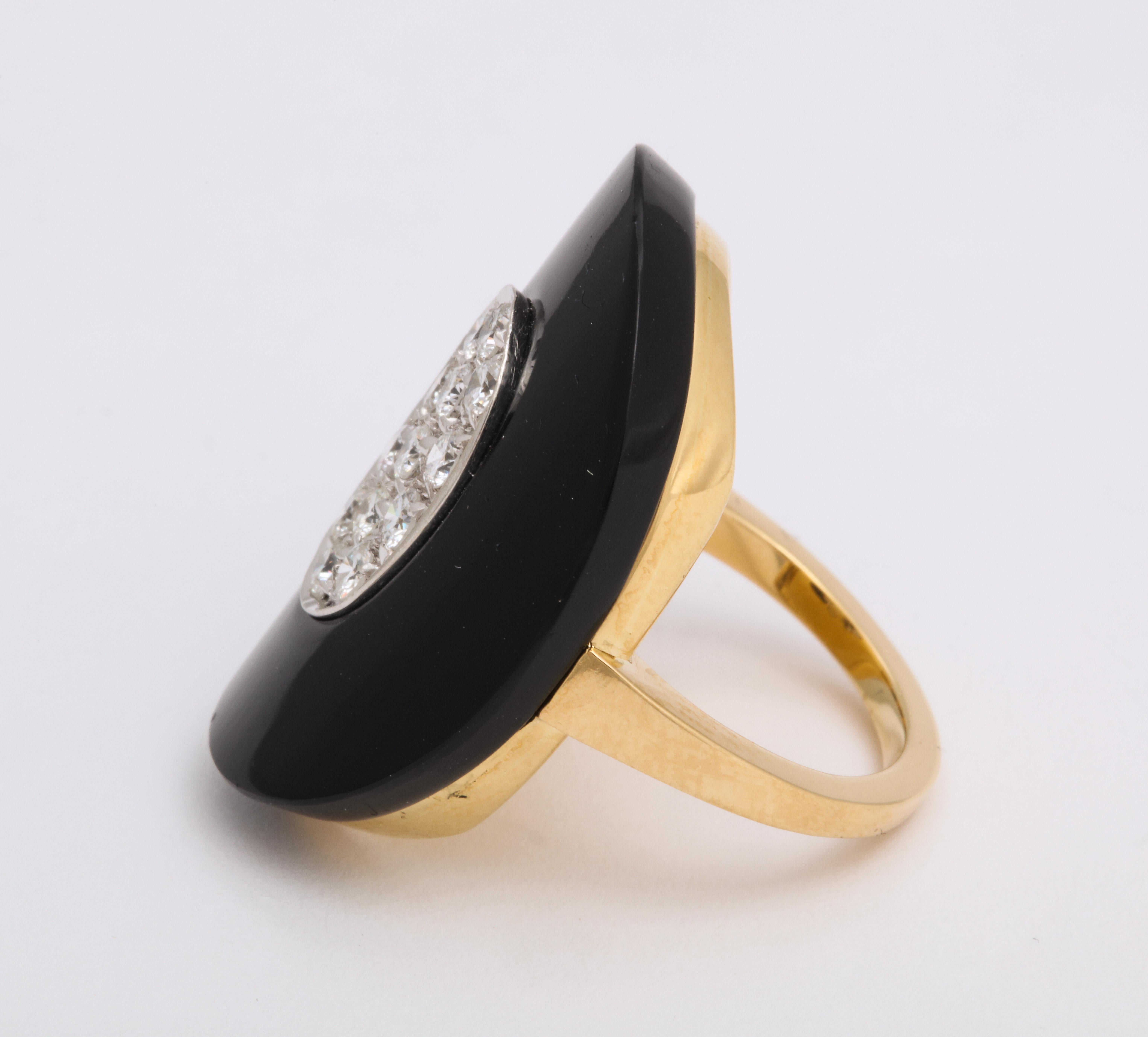 Quality? Check.  Fashionable? Check.  Value? Check, check!  This stylish c1970 ring with black onyx and pave diamond is high drama but easy on the budget.  Curved design is super comfortable to wear, too.  Estimated total diamond weight = 1.00ct  