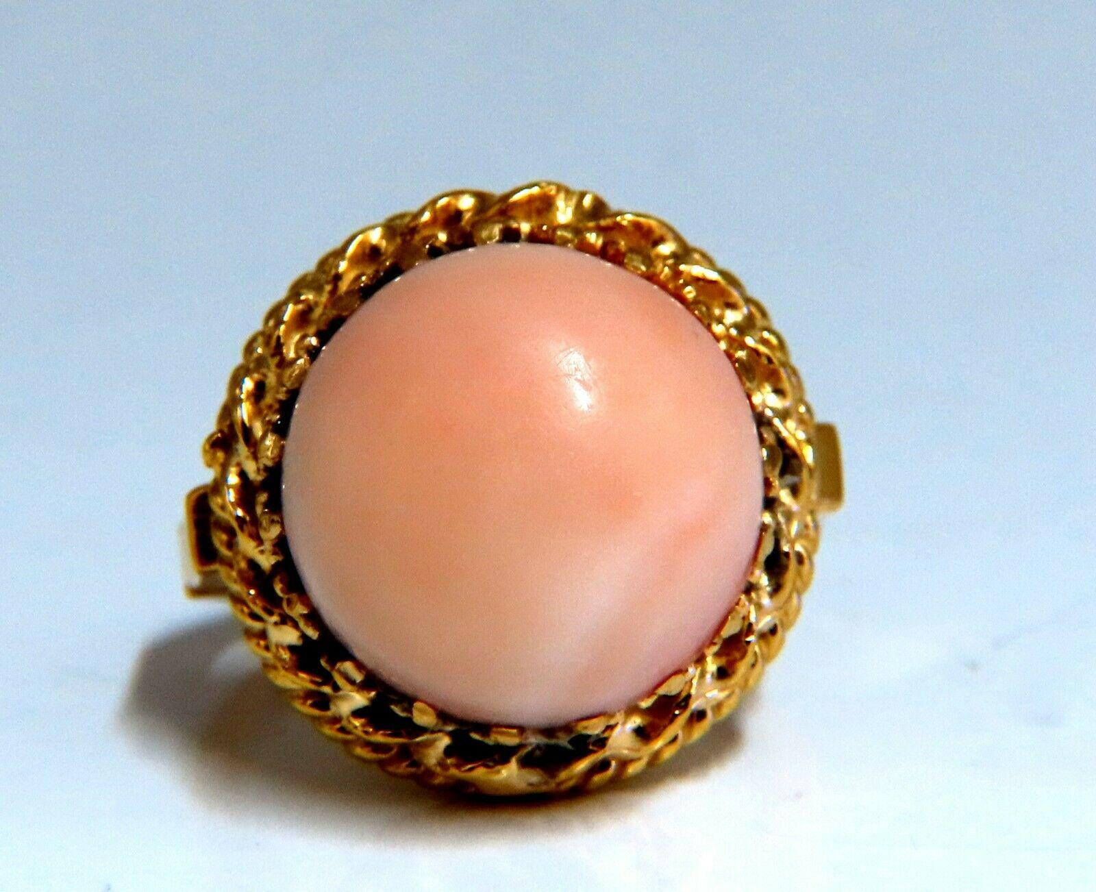 Victorian vintage natural Coral ring.

Pink Coral measures 14.3 mm wide.

Ring measures 18 mm wide.

Depth of ring 11.5 mm.

14 karat yellow gold 8.3 grams.

Current size 5 1/2 and we may resize, please inquire.