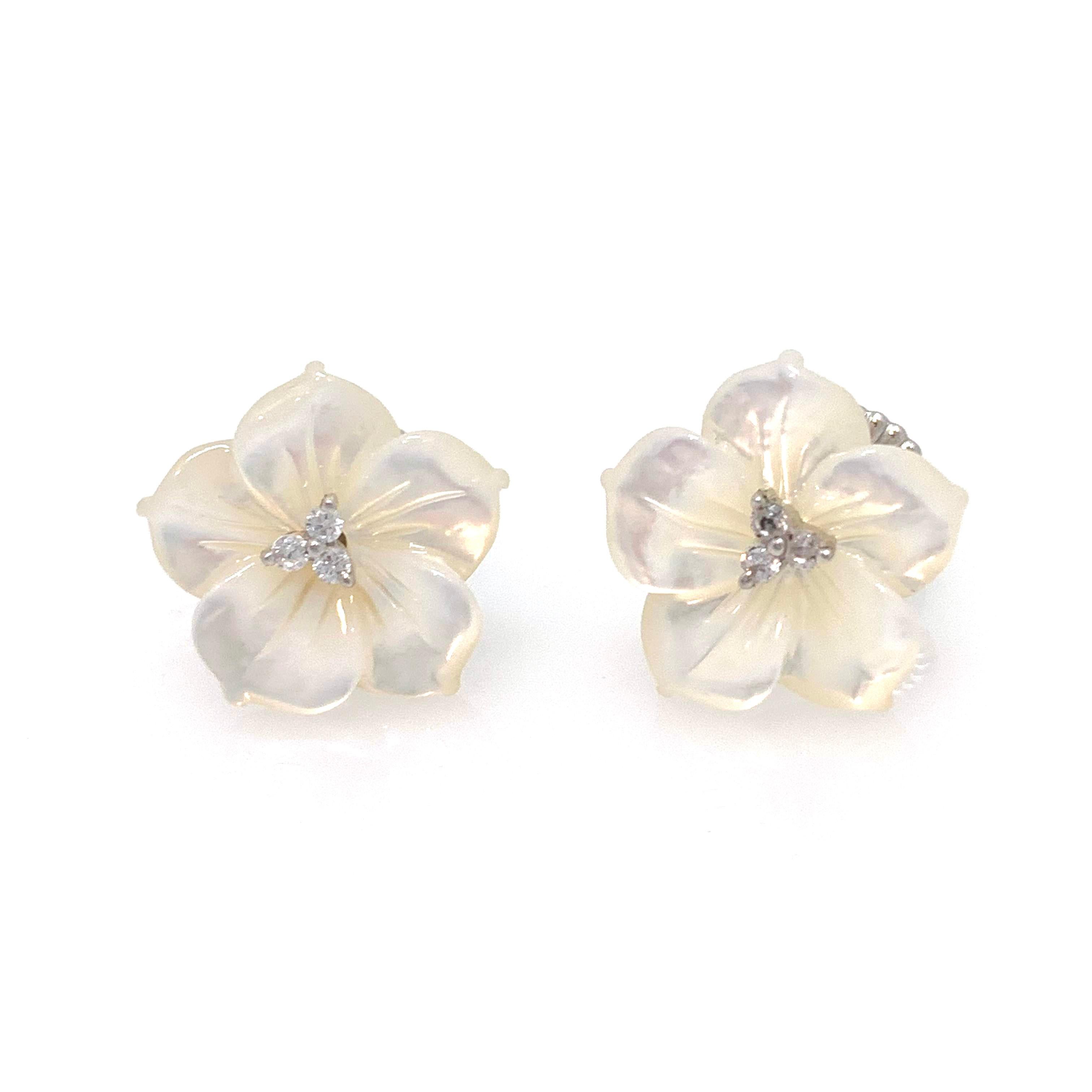 Elegant 18mm Carved Mother of Pearl Flower Sterling Silver Earrings

This earrings features 2 pieces of 18mm mother of pearl carved into beautiful three dimension flower, adorned with round simulated diamond cz, handset in platinum  rhodium plated