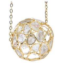 Ciondolo a sfera con fetta di diamante in oro giallo 18 carati AD1908