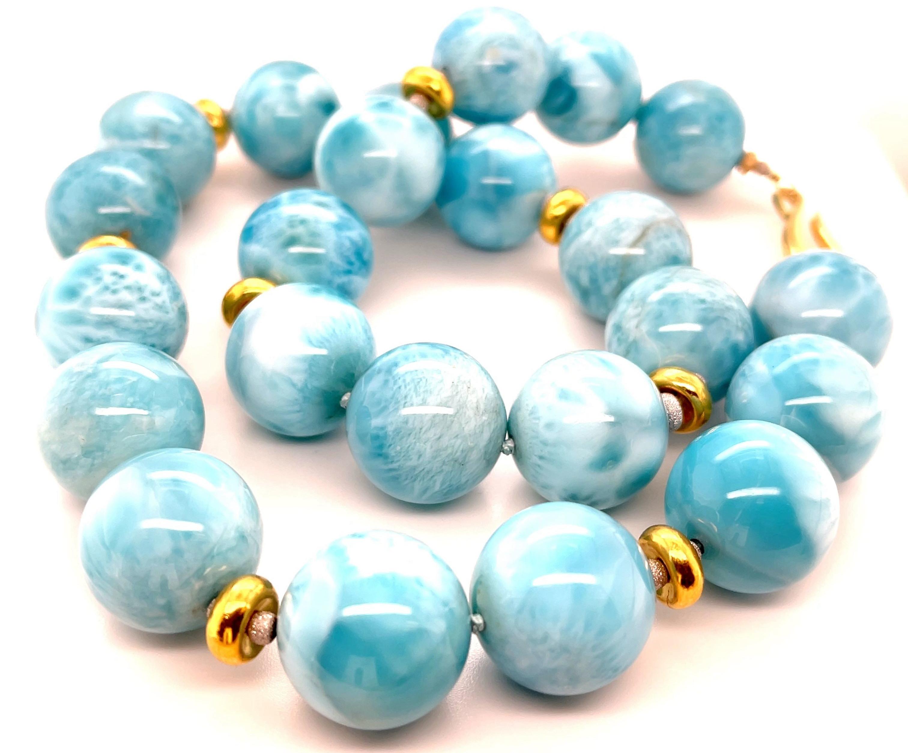This fine, gem-quality blue larimar and gold beaded necklace is extremely rare! The unusually large and perfectly matched, 18mm round larimar beads have strikingly uniform, bright robin's egg blue body color with gorgeous white marbling that makes