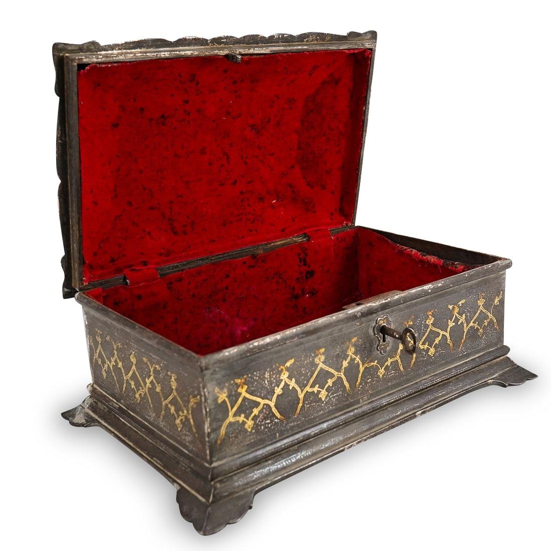 Antique Mughal empire period iron or steel casket (box) with gold and silver koftgari inlaid designs of foliage.  11 1/4 by 7 1/4 by 5 1/4 inches.