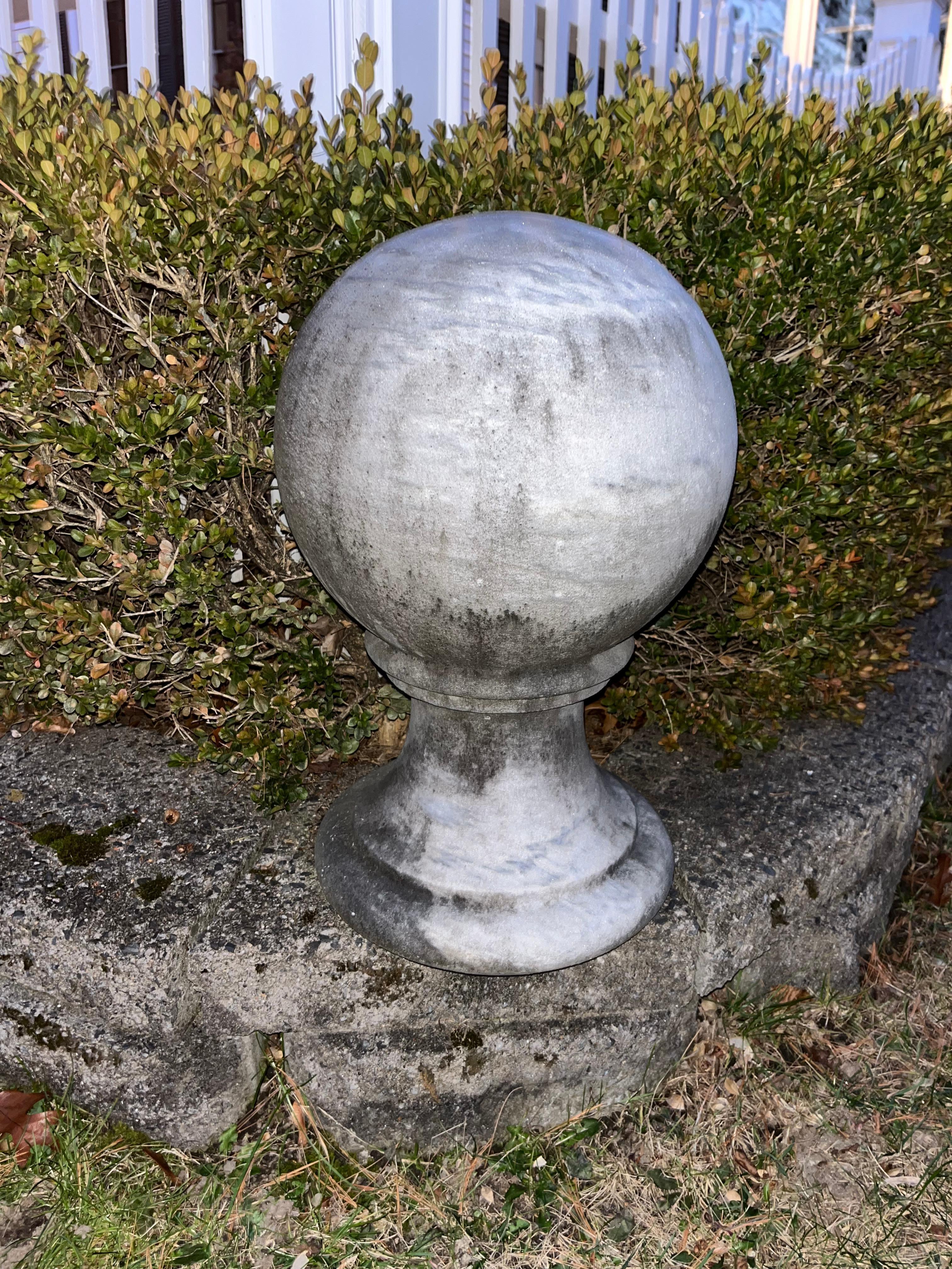 American 18th/ 19th c. neoclassical hand carved stone ball. with round base For Sale