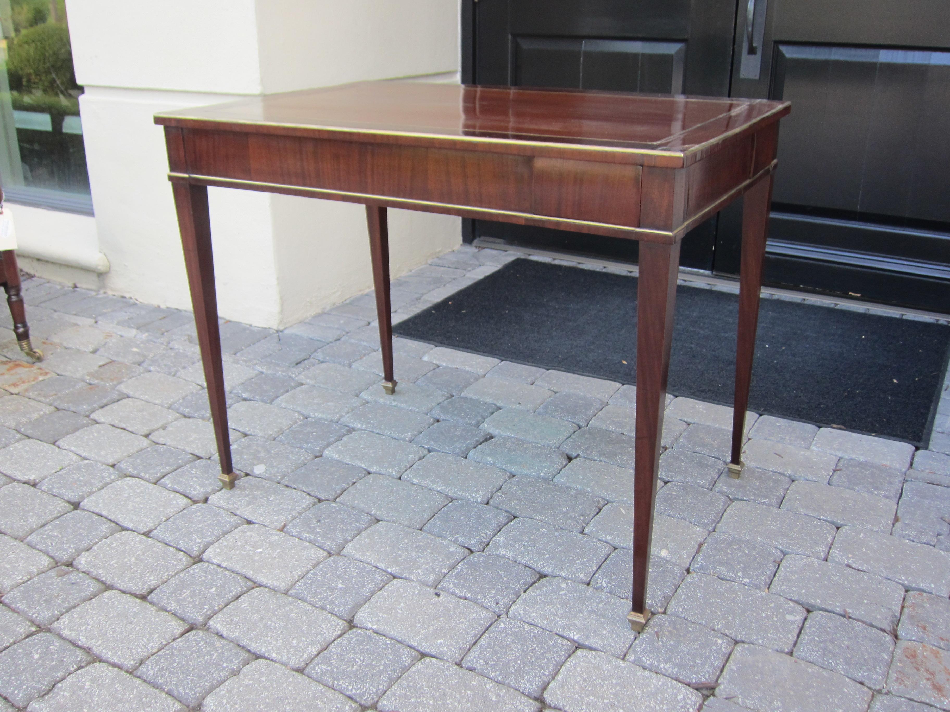 18th-19th century Baltic wood game table with brass inlay.