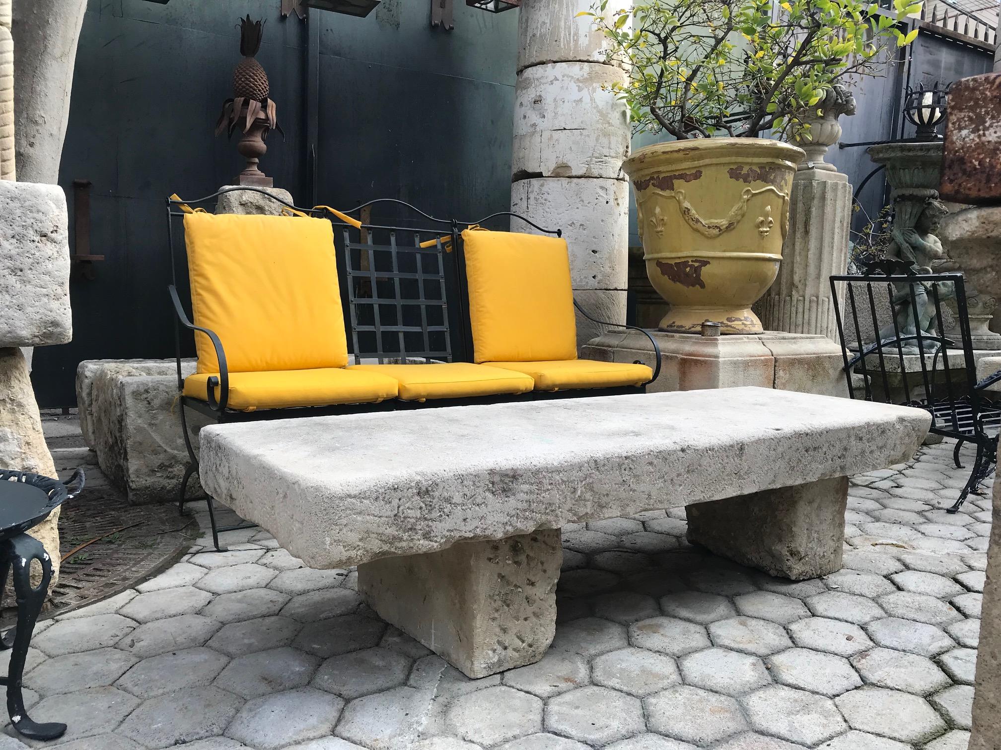 18th-19th century carved stone antique garden low coffee outdoor indoor table. It will be the perfect touch by an outdoor fireplace , This table has a lot of charm and character. It can work in a Mid-Century Modern or an old charm rustic Provençal