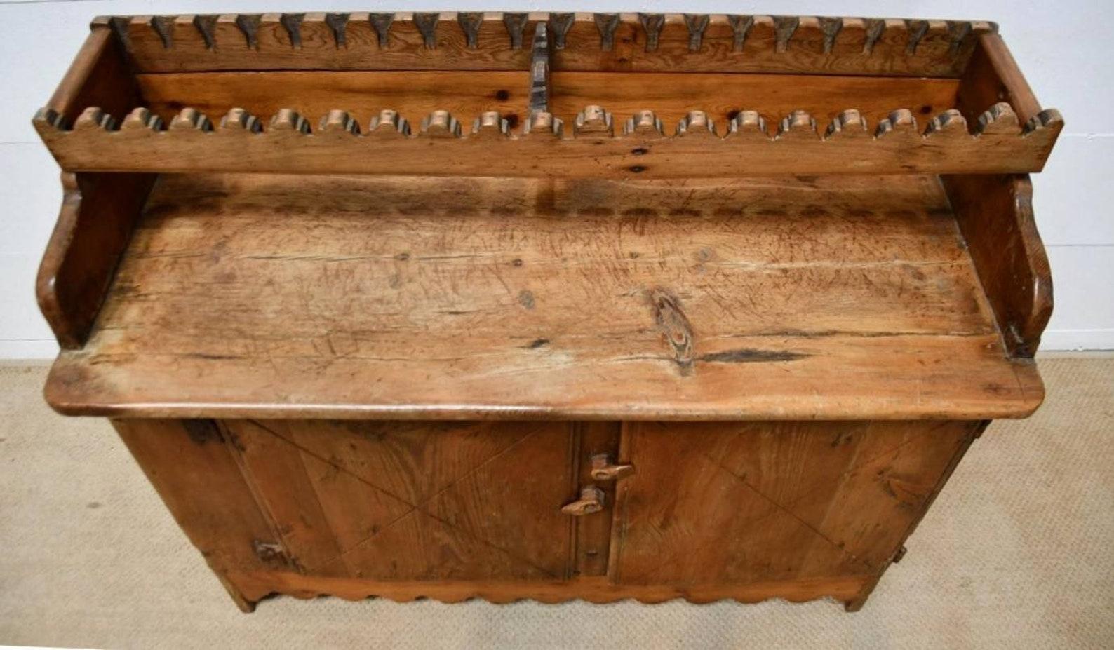 Patina Perfection! A rustic late 18th / early 19th century country French farmhouse kitchen buffet with open dish rack.

Born in the rural French countryside, hand-crafted of solid pine with traditional mortise and tenon pegged construction,