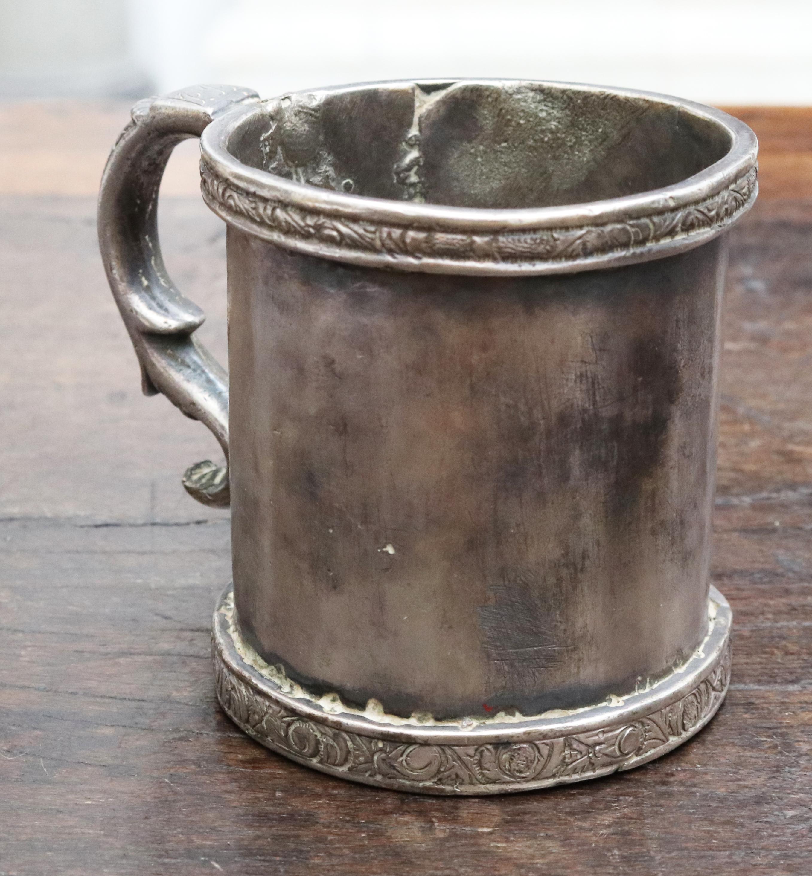 18th-19th century cylinder shaped silver cup with handle, possibly Bolivian. 

Total silver by weight: 393.6 g.