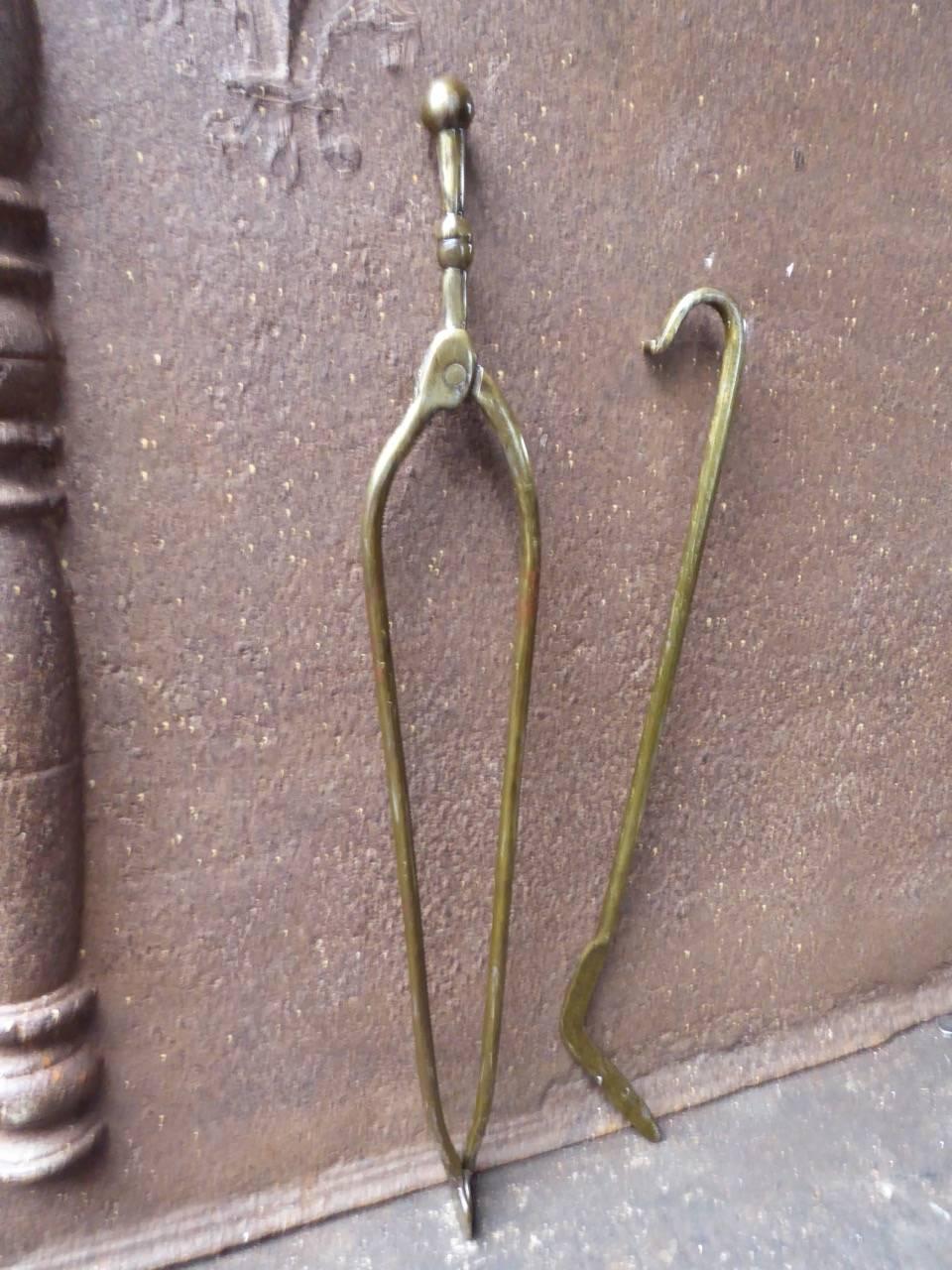 18th-19th century Dutch fireplace tool set - fire irons made of wrought iron. The set is painted in brass color.

We have a unique and specialized collection of antique and used fireplace accessories consisting of more than 1000 listings at 1stdibs.