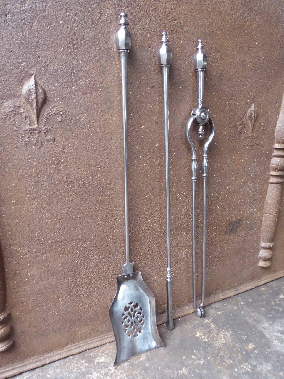 18th-19th century English Georgian fireplace tool set - fire irons made of polished steel.

We have a unique and specialized collection of antique and used fireplace accessories consisting of more than 1000 listings at 1stdibs. Amongst others, we