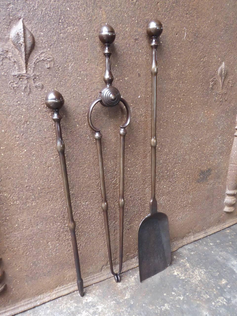 18th-19th century English Georgian fireplace tool set - fire irons made of wrought iron.

We have a unique and specialized collection of antique and used fireplace accessories consisting of more than 1000 listings at 1stdibs. Amongst others we