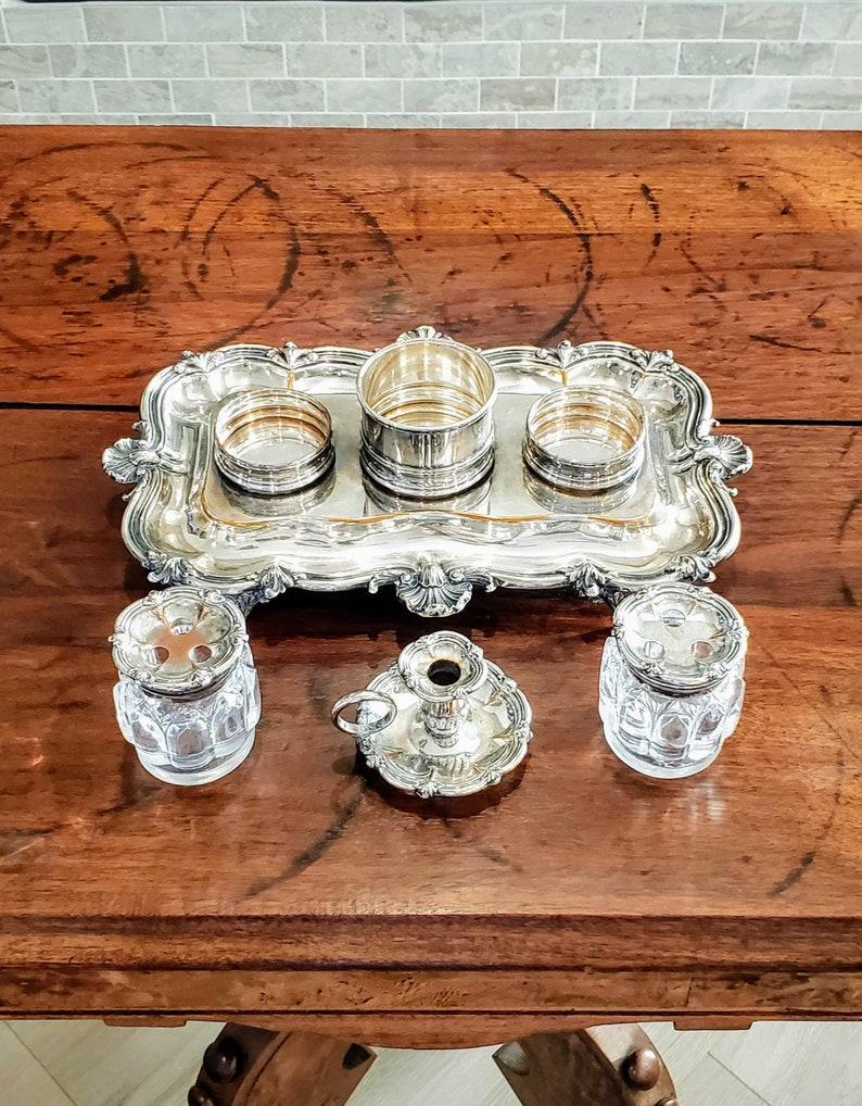 A fine quality Georgian III period silver plated inkstand by celebrated English silversmith Matthew Boulton, displaying all of the timeless elegance and sophisticated style the period in known for. Signed, Boulton's double sunburst mark to verso,