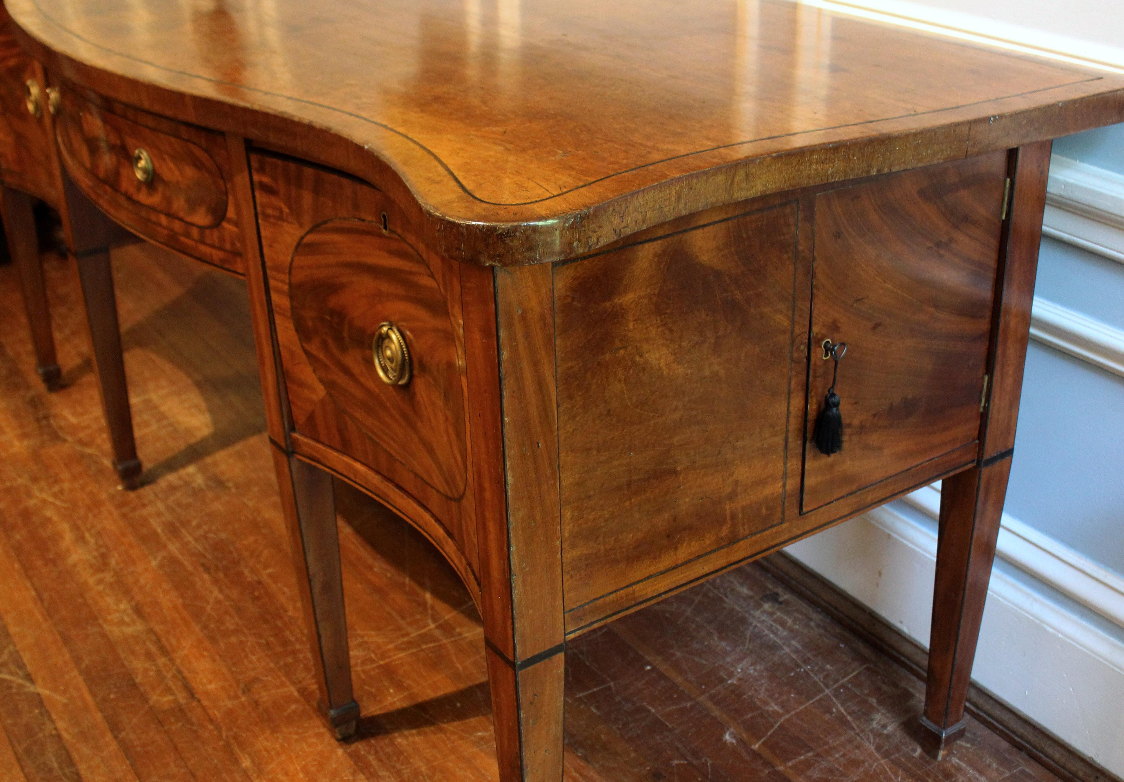 Oak Late 18th to Early 19th Century English Serpentine Form Sideboard For Sale