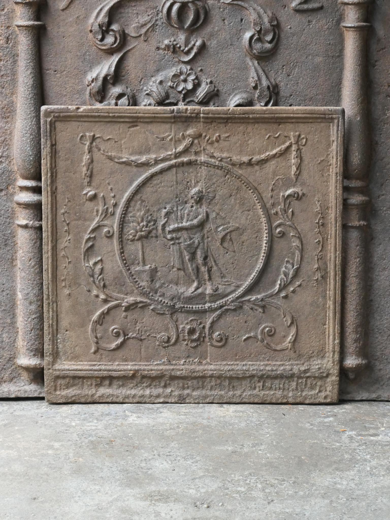 Late 18th or early 19th century French Neoclassical period fireback of the god Apollo with his lyre. Apollo is the god of light, sun, truth, prophecy, music and joy. Also the saving God, both in emergency caused by an epidemic or an invasion of