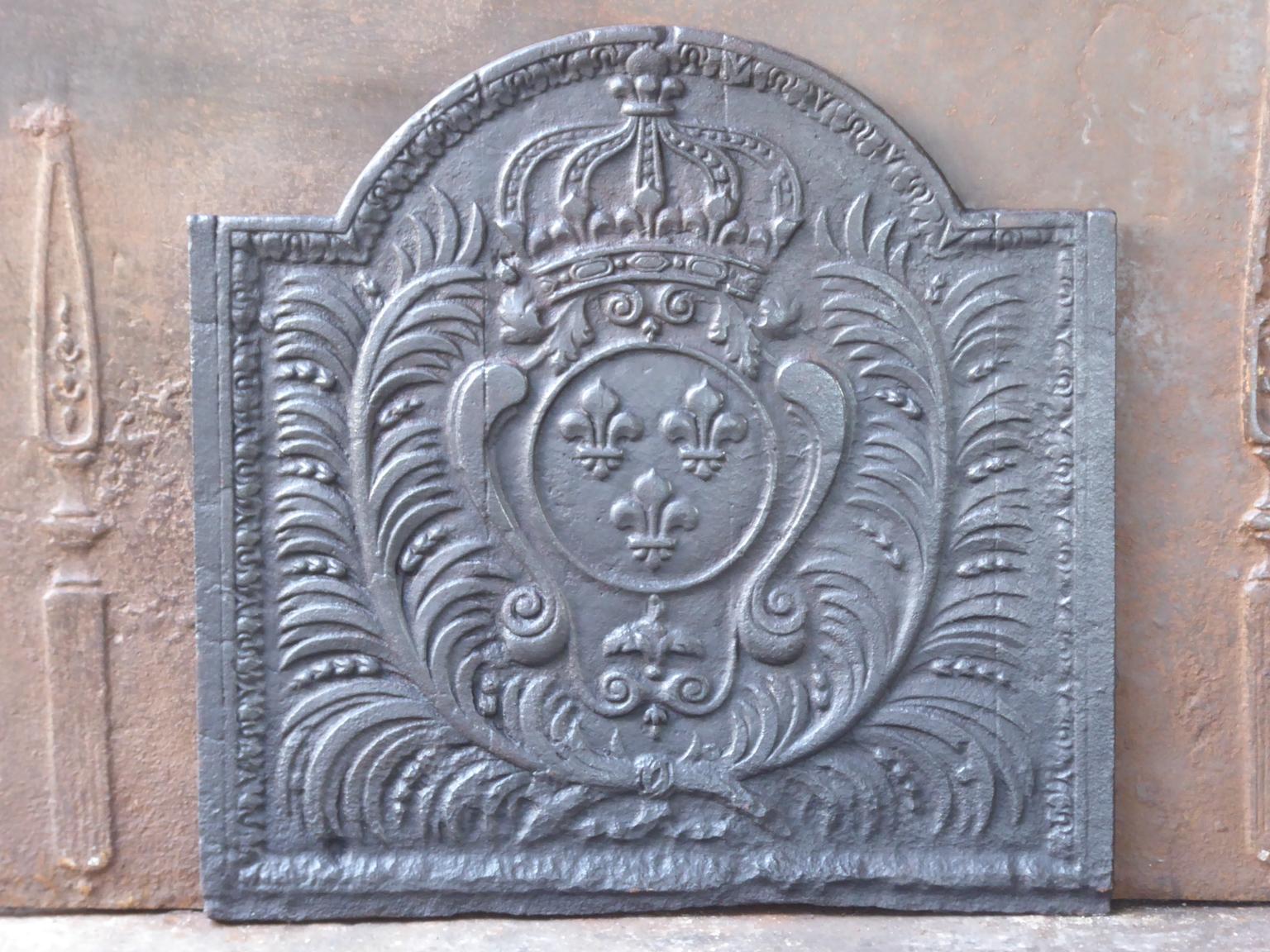18th-19th century French Louis XV fireback with the arms of France. This is the coat of arms of the House of Bourbon, an originally French royal house that became a major dynasty in Europe. It delivered kings for Spain (Navarra), France, both