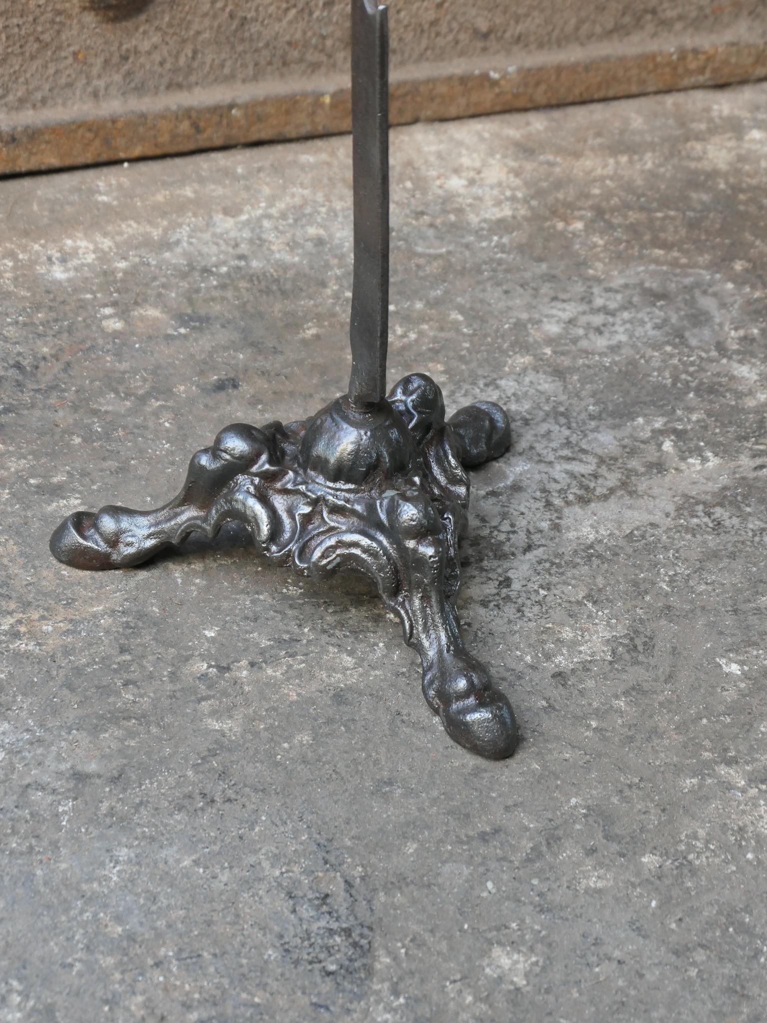Functional 18th - 19th century French Napoleon III roasting jack made of cast iron, wrought iron, brass and copper. It is used for cooking in a kitchen fireplace.







