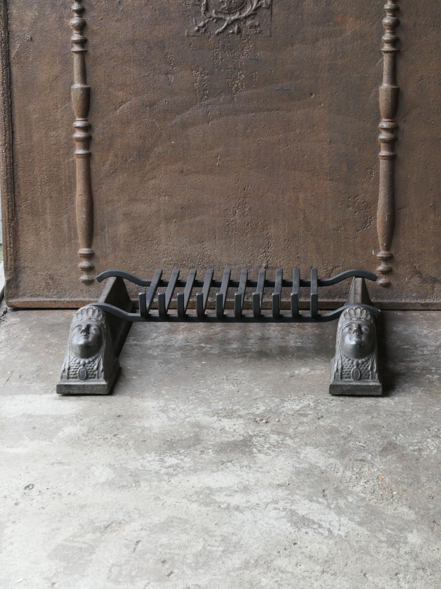 18th-19th century French neoclassical fireplace basket - fire basket made of cast iron and wrought iron. The basket is in a good condition and is fully functional.