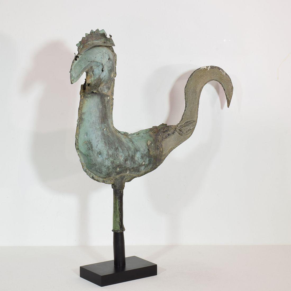 Beautiful antique folk art copper rooster with an wonderful old repair. It once got a zinc tale. A real unique find.
France, circa 1750-1850. More photo's available on request
Weathered small losses and old repairs. measurements include the wooden