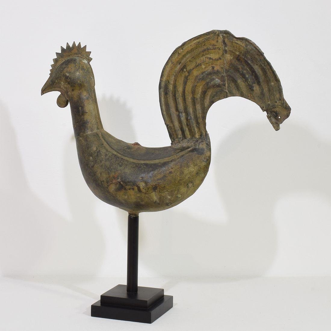 Beautiful and rare antique folk art copper rooster with an wonderful patine. A real unique find.
France, circa 1750-1850. More photo's available on request
Weathered small losses and old repairs. measurements include the wooden base.