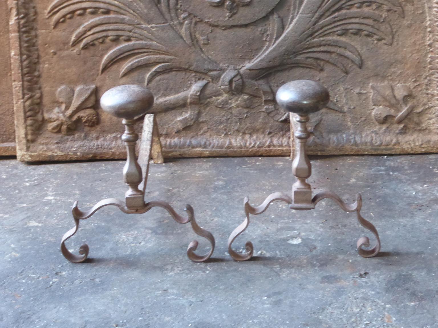 18th-19th century French Louis XV andirons made of wrought iron.







  