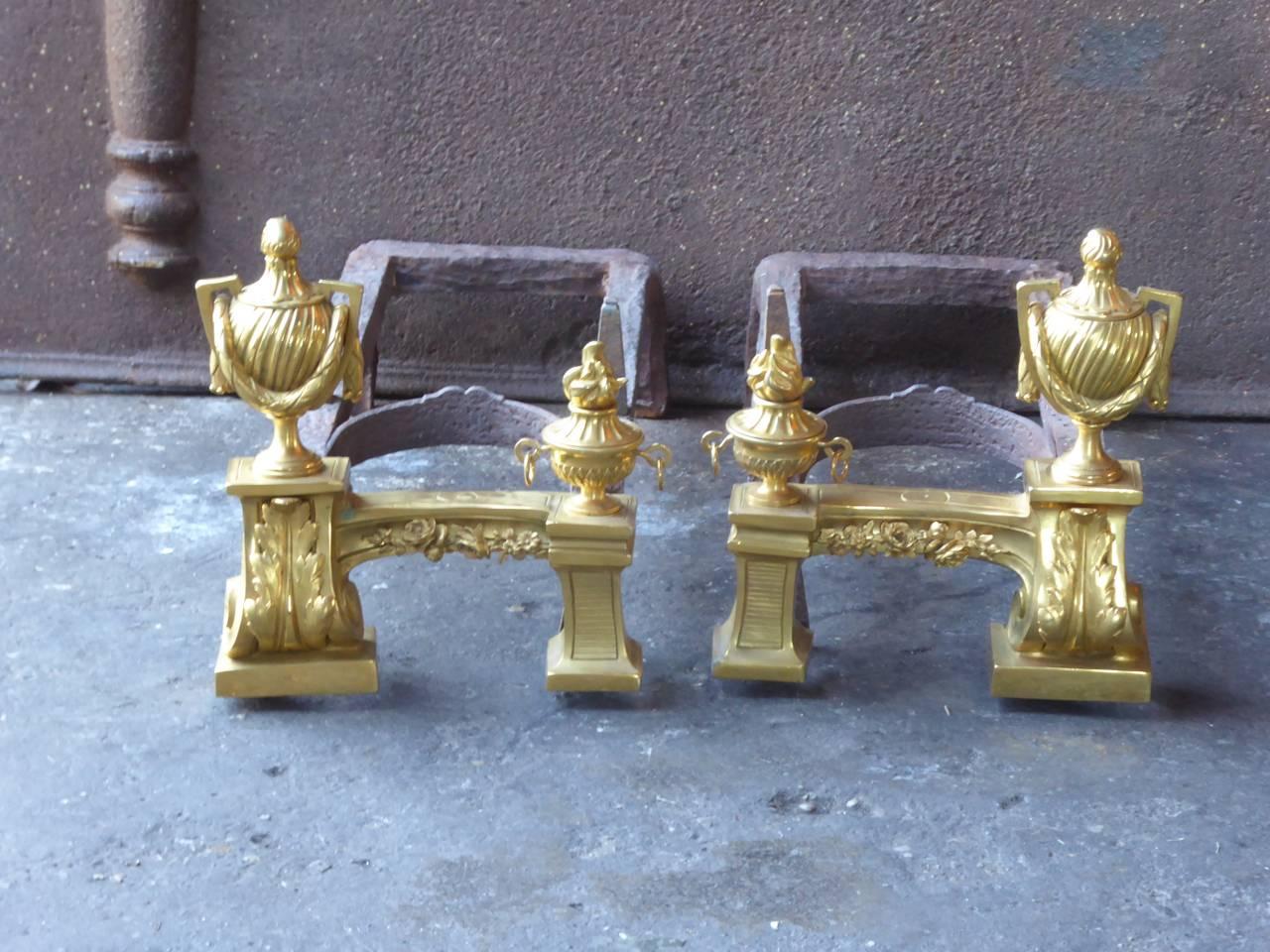 18th-19th century French neoclassical andirons made of ormolu and wrought iron. The condition is good.

One of the most valuable secrets of French metalworkers in the 18th and early 19th century was the gilding of brass and bronze, called ormolu.
