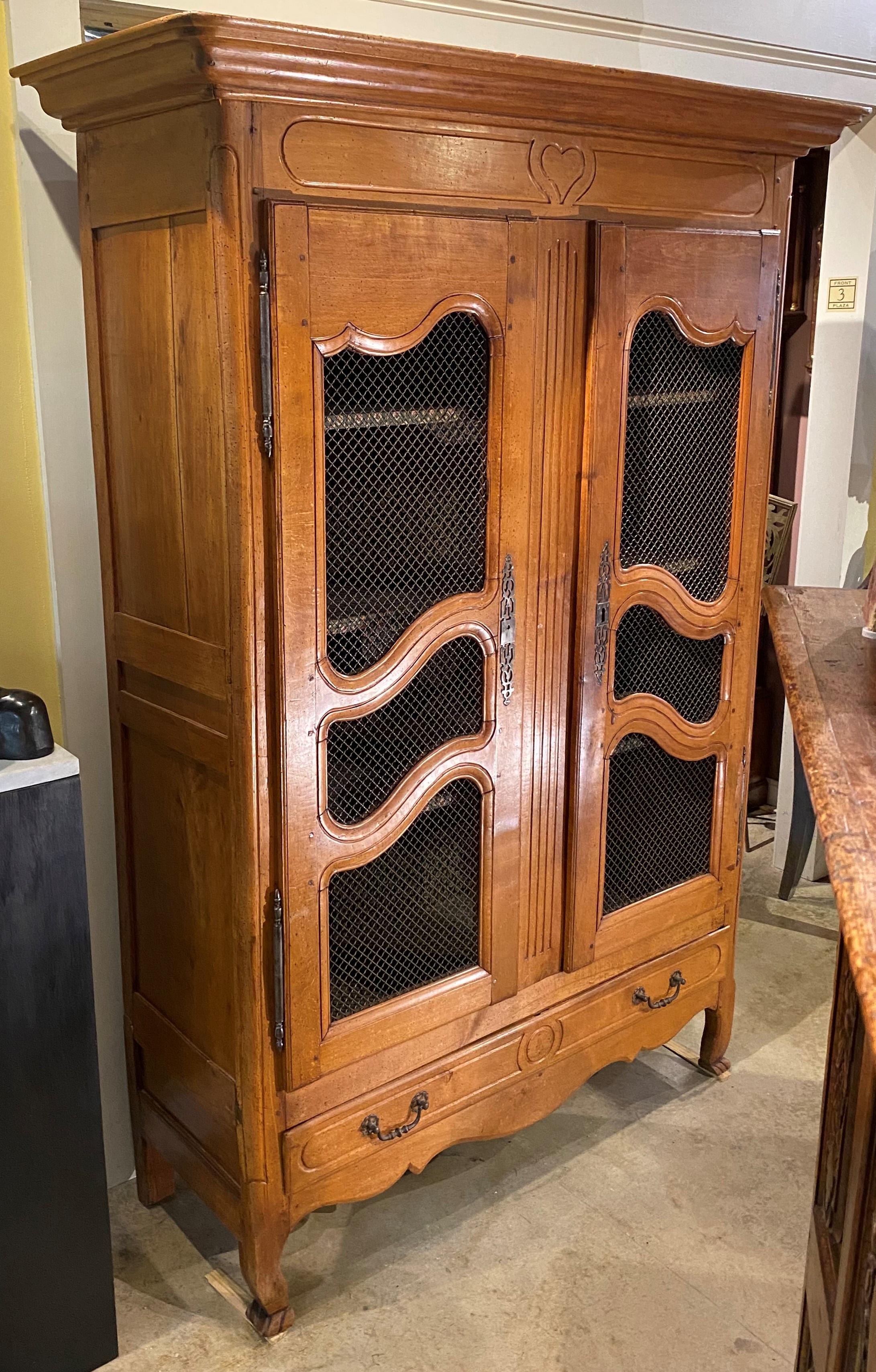 Hand-Carved 18th / 19th Century French Provincial Fruitwood Armoire with Wire Front Doors For Sale